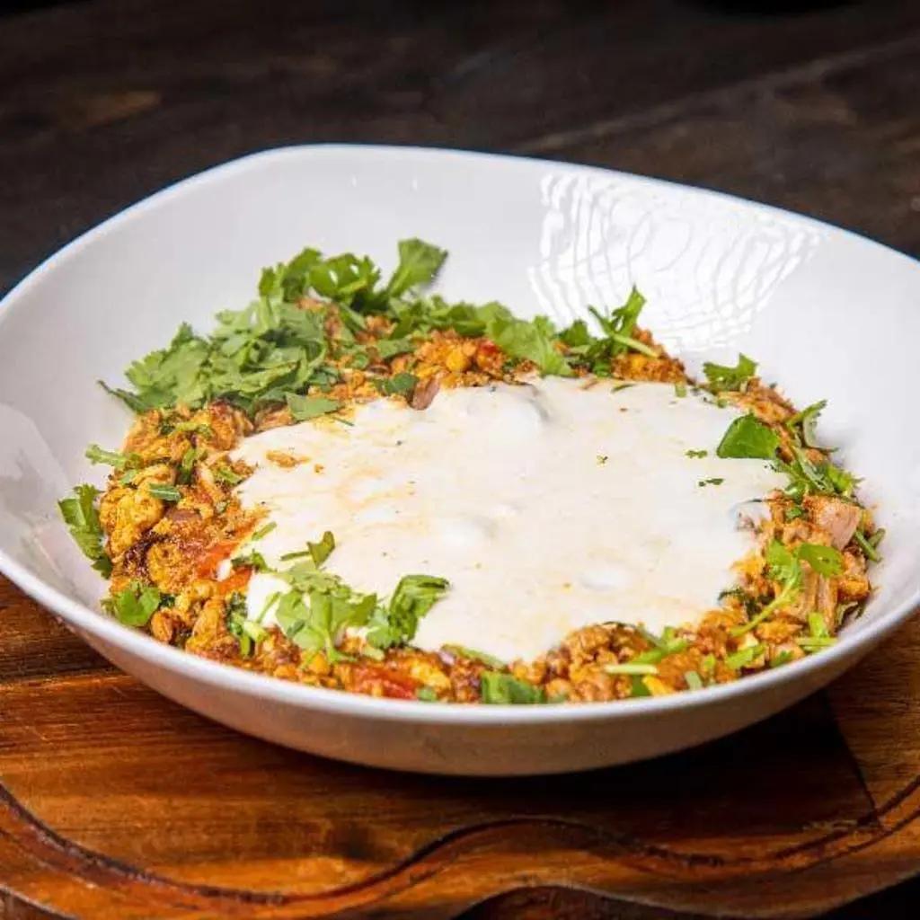 Shakshuka with Cheese On Stone